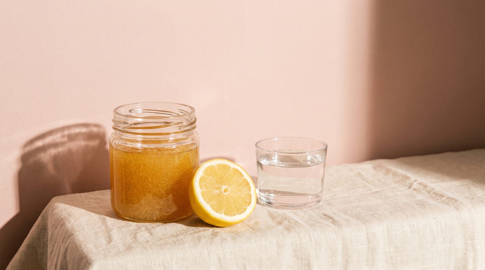 Sugar paste, a lemon and a glass of water — the three ingredients of sugaring